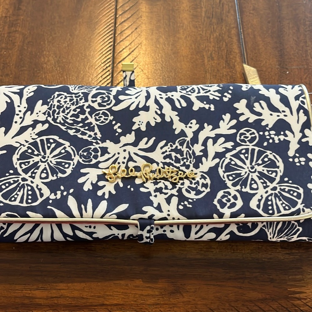 Lily Pulitzer jewelry roll for travel  super cute ties in front never used